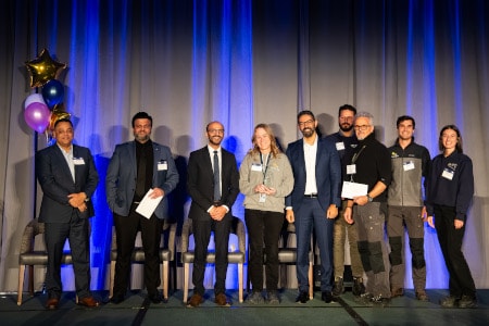a group of people posing for a photo