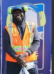 a man wearing a safety vest