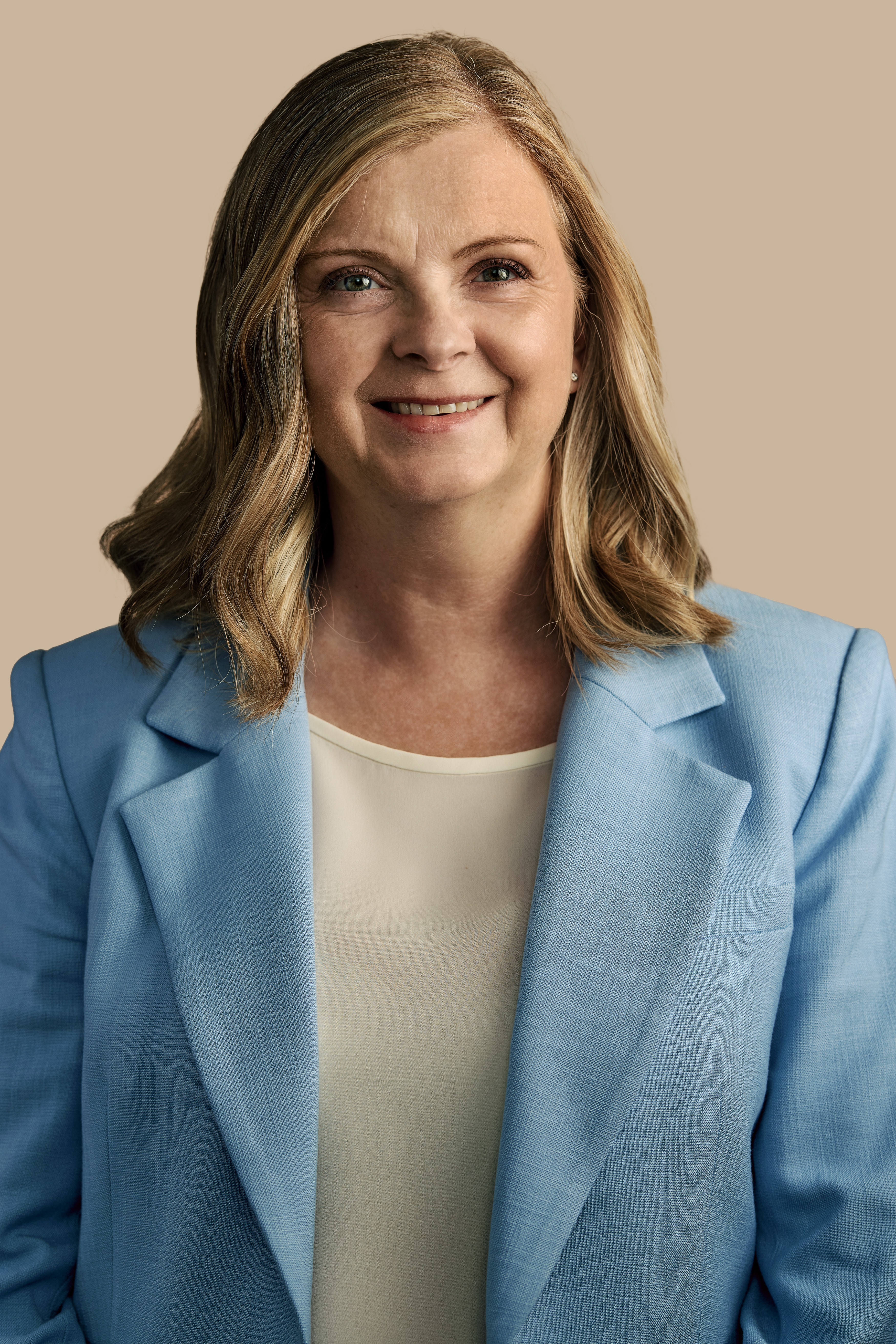 a person wearing a blue sweater