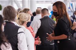 Deborah Flint talking to employees at the I Am Toronto Pearson Thank You event