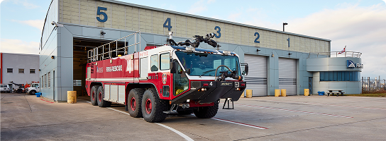 a fire truck parked in front of a building