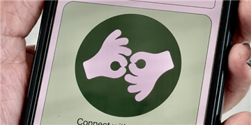 a hand holding a card