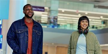 a man and a woman smiling