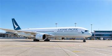 a large white airplane on a runway
