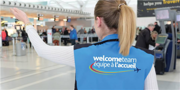 a person holding a blue shirt