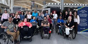 a group of people in wheelchairs
