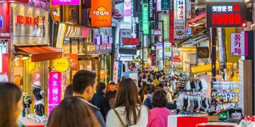 a busy street with many people