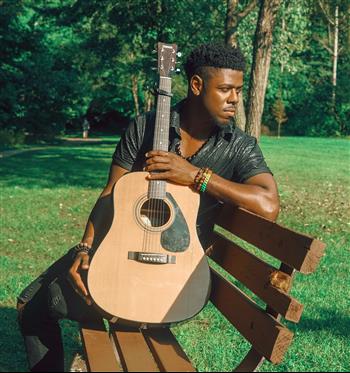 a man playing a guitar