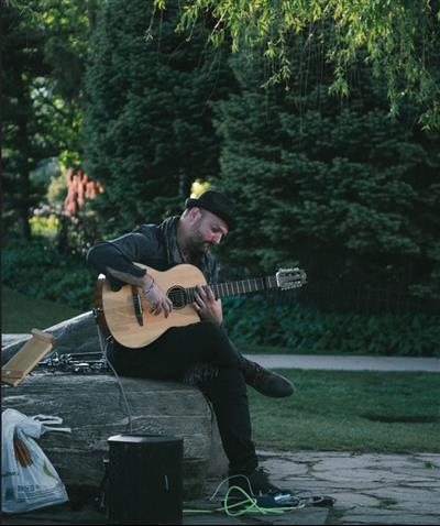 a man playing a guitar