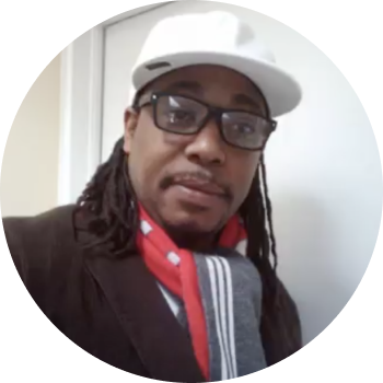 a person wearing a white hat and glasses