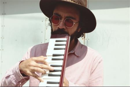 a man playing a piano