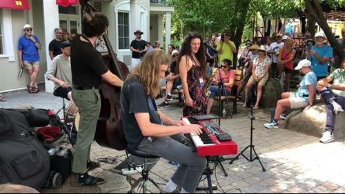 a group of people playing instruments