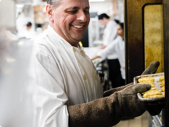 a man holding a bird