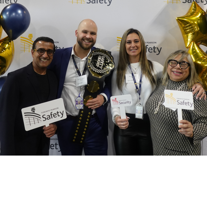 a group of people holding awards