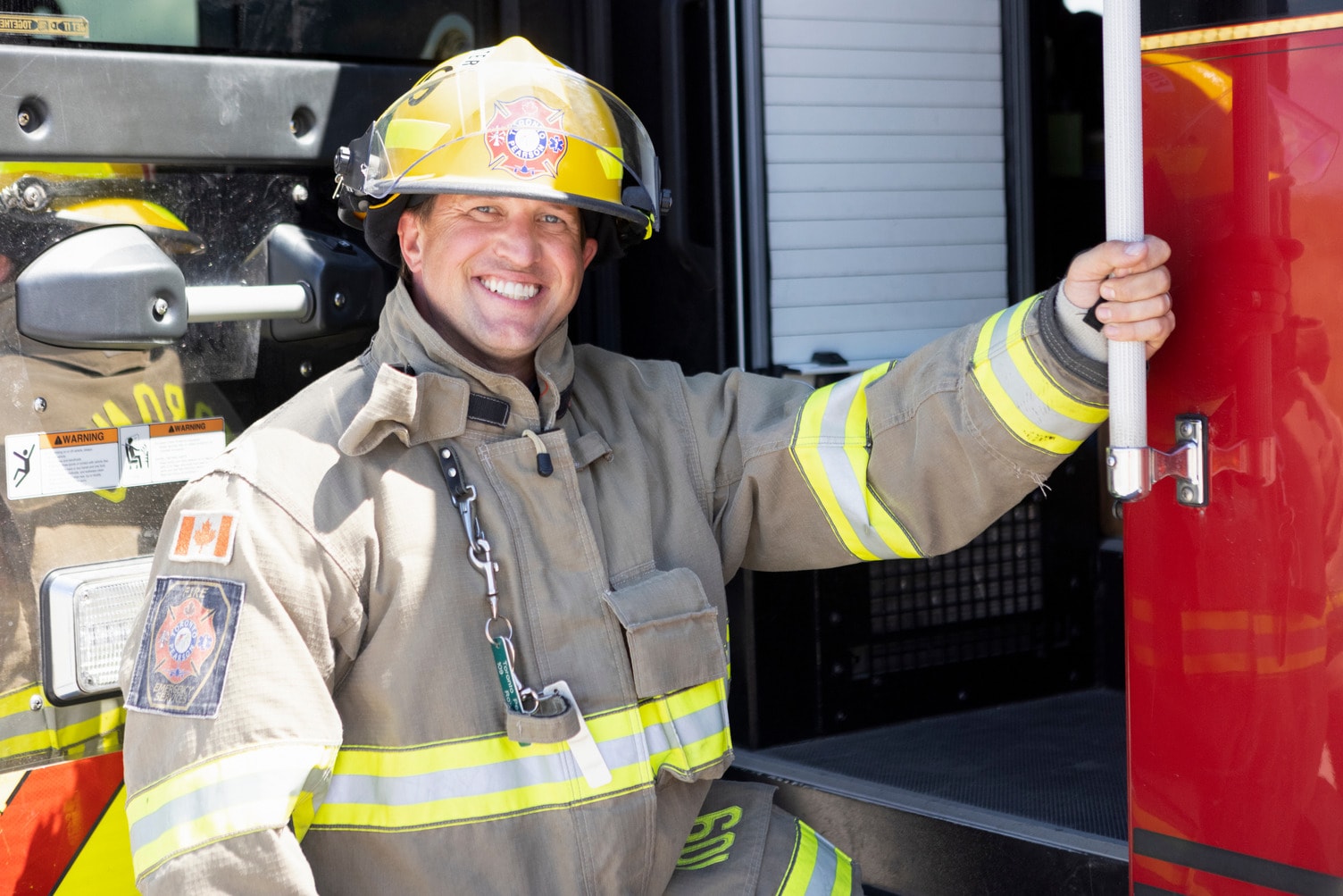 a firefighter holding a hose
