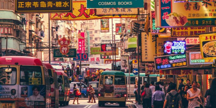 a busy street with many signs