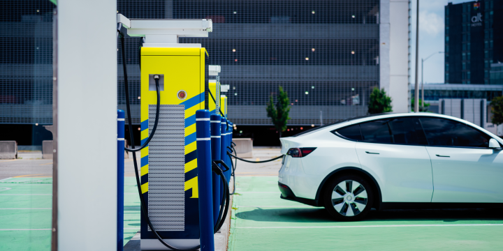 a car parked next to a machine