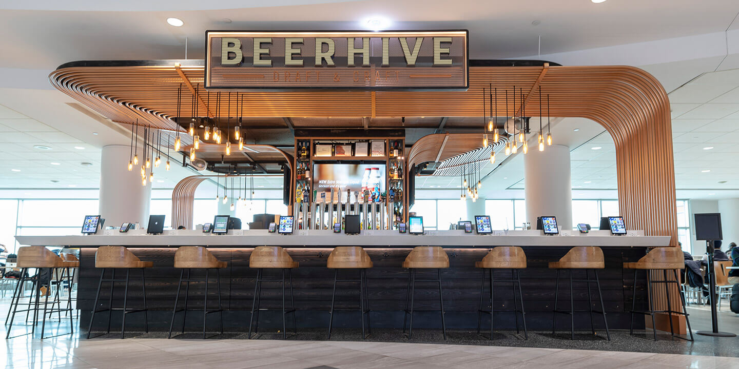 Beerhive sign above bar and iPads at every seat.