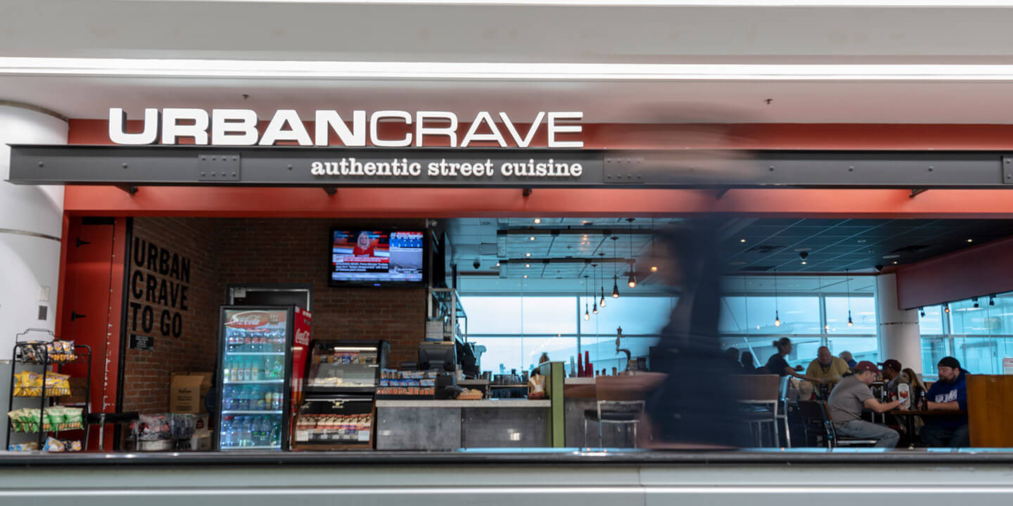 Urban Crave sign and ordering counter with snack displays