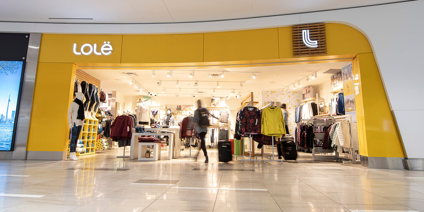 Outside of Lole Toronto airport shop with clothing displays