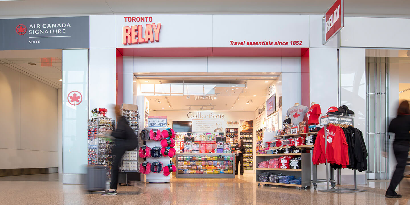 Opening into Relay storefront with shelves and clothing racks