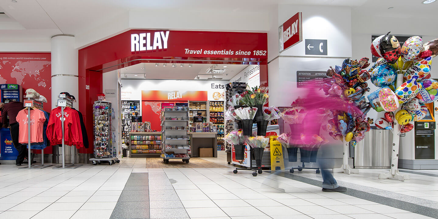 Outside view of Relay storefront with balloons